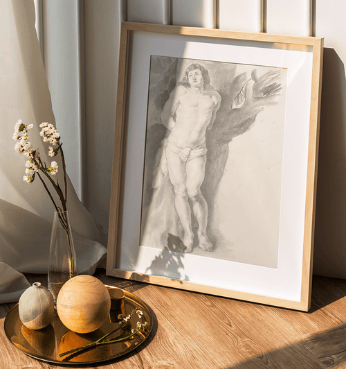 Framed graphite drawing of a standing figure